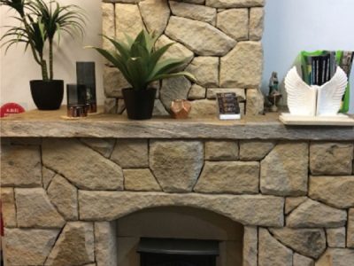 Sandstone fireplace feature wall